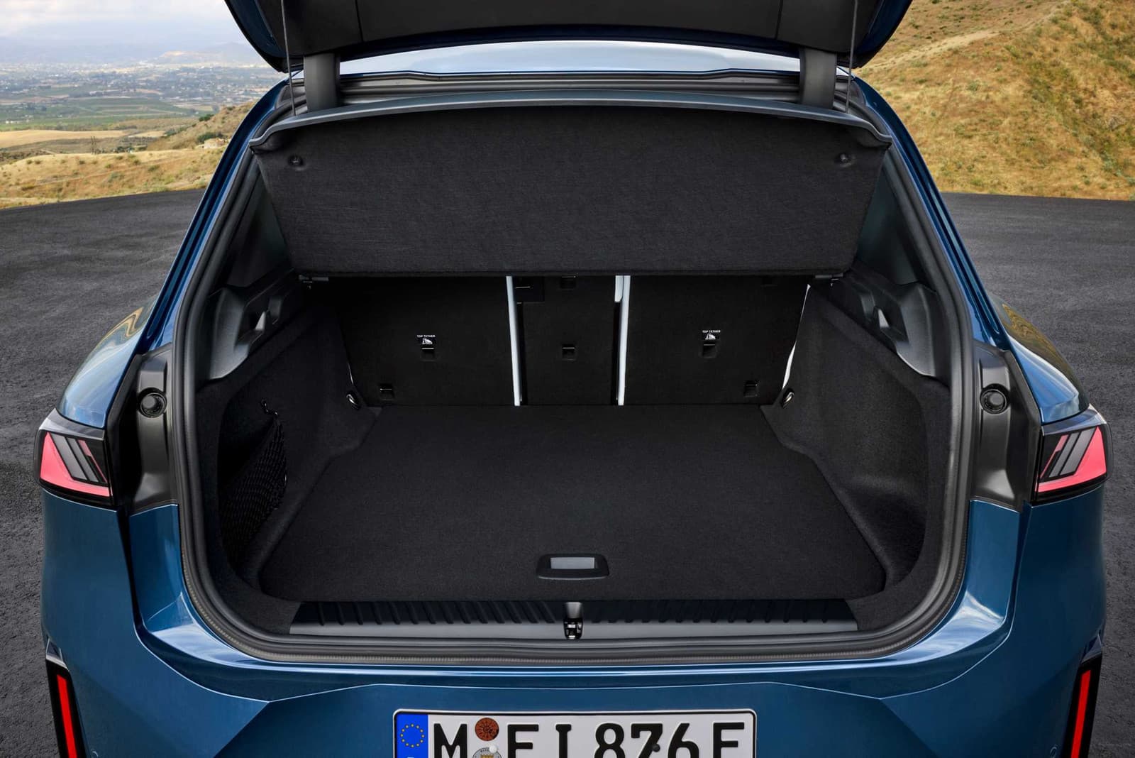 Open boot of the BMW iX3 with the rear seats up