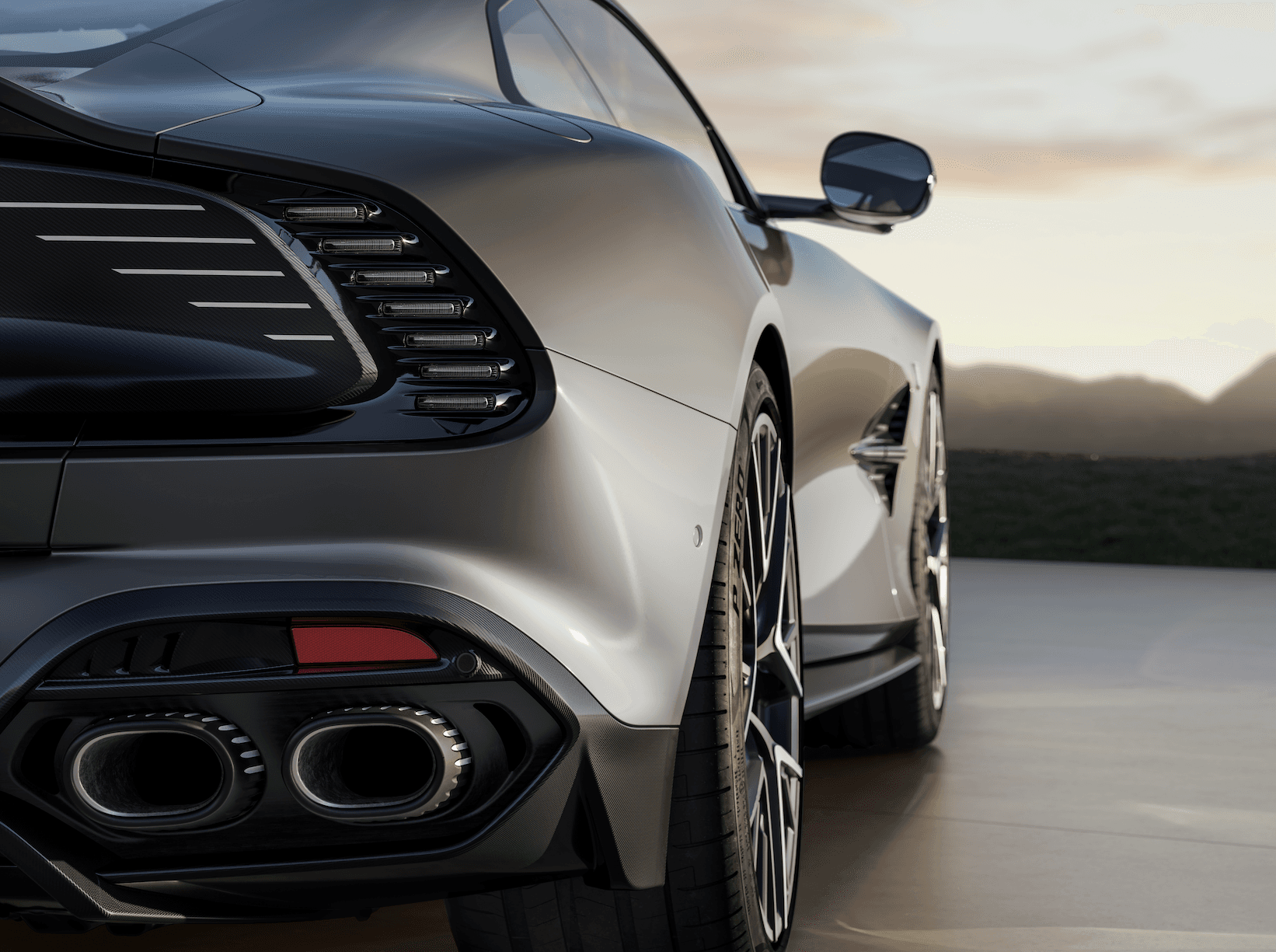 Aston Martin Vanquish 25 detail stainless steel side strakes exhaust finisher