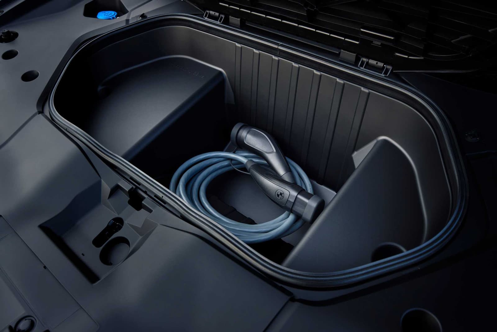 Front boot of the BMW iX3 with the charging cable stowed